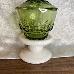 Elegant Green Glass Jar with White Base